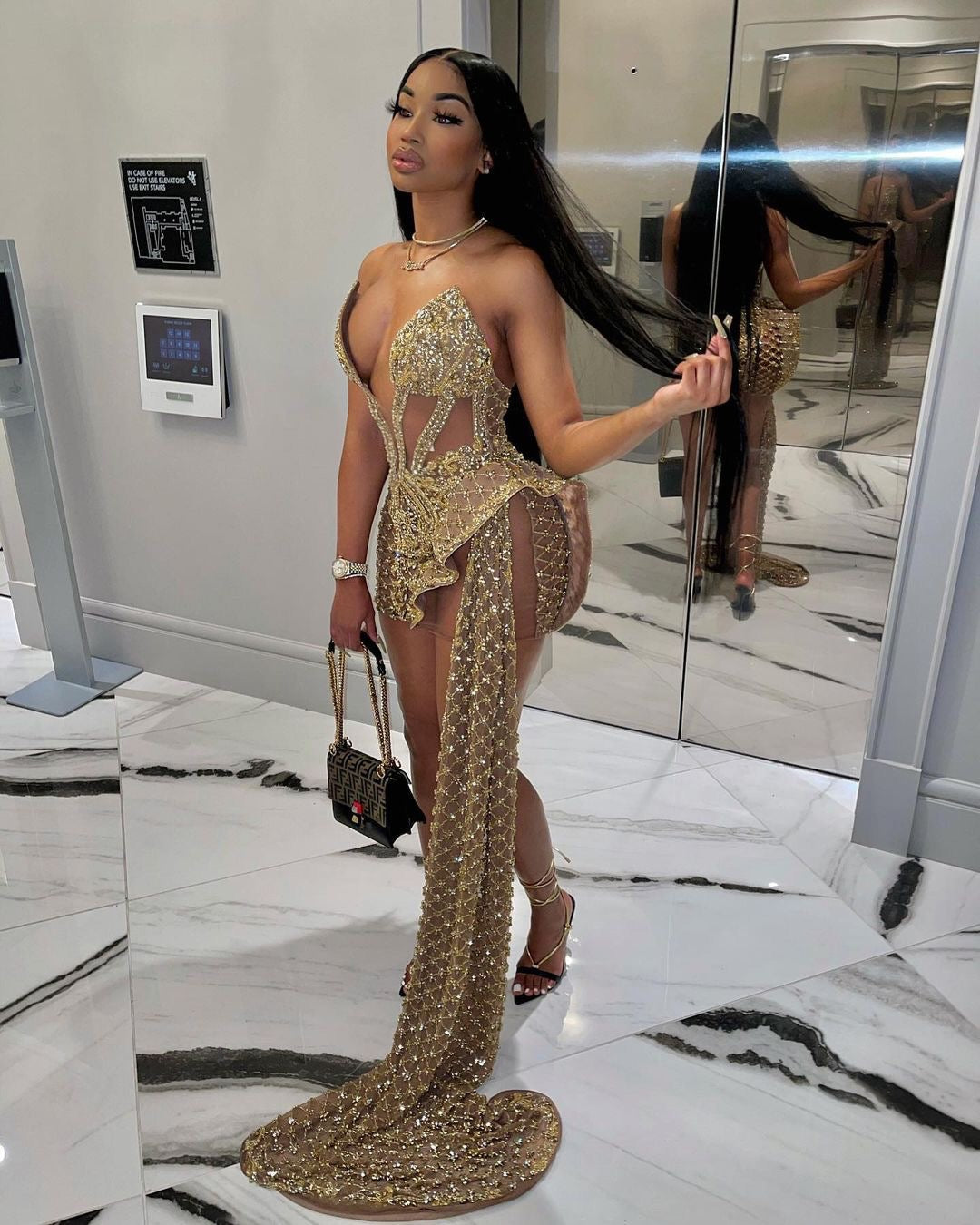 Yovilliri V golden tail mini dress