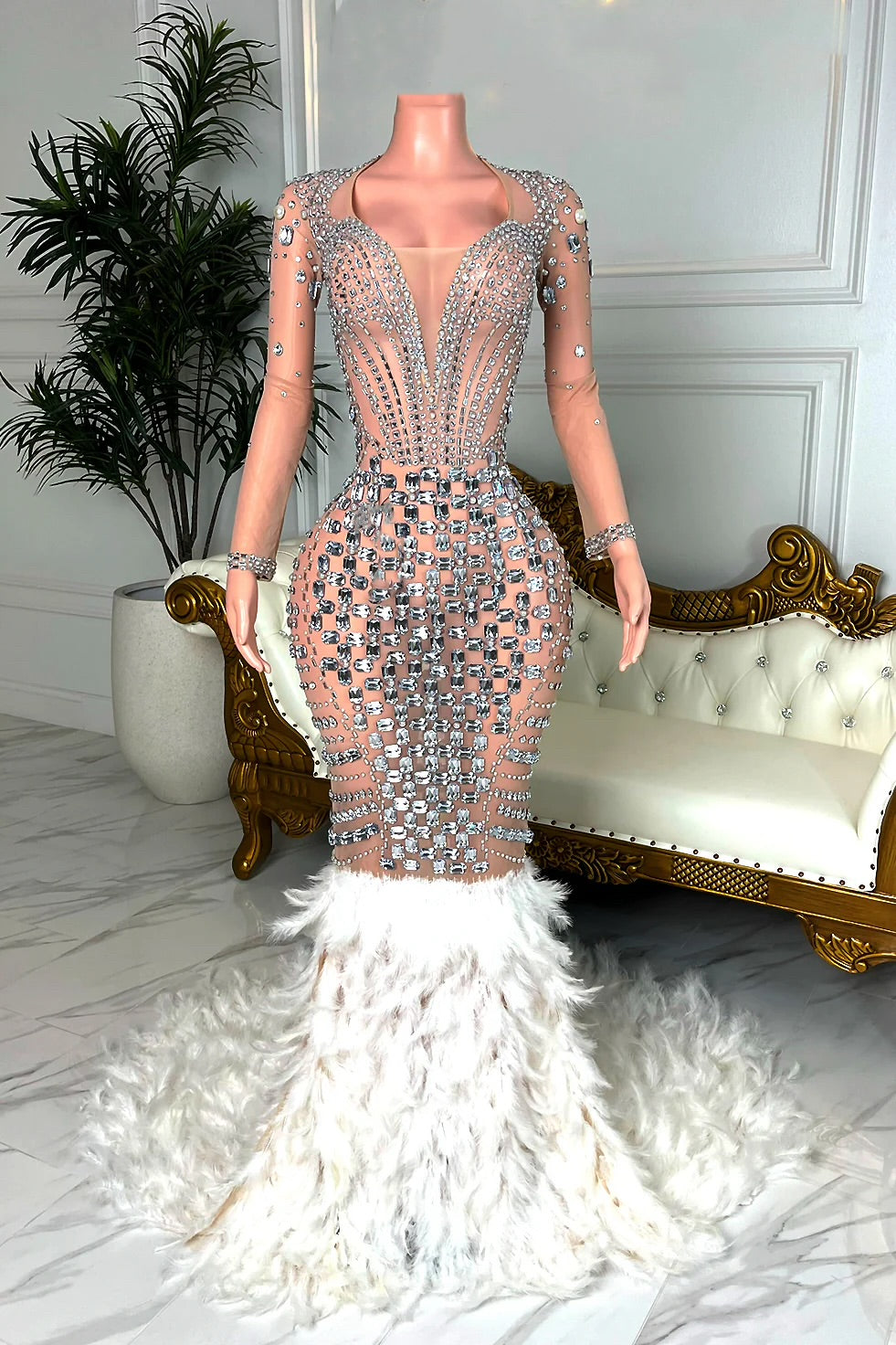 Ulvissa I feather trail gown