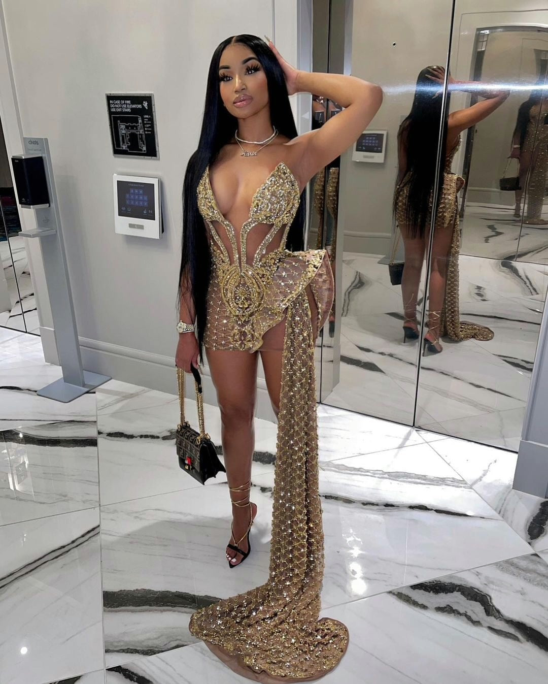 Yovilliri V golden tail mini dress