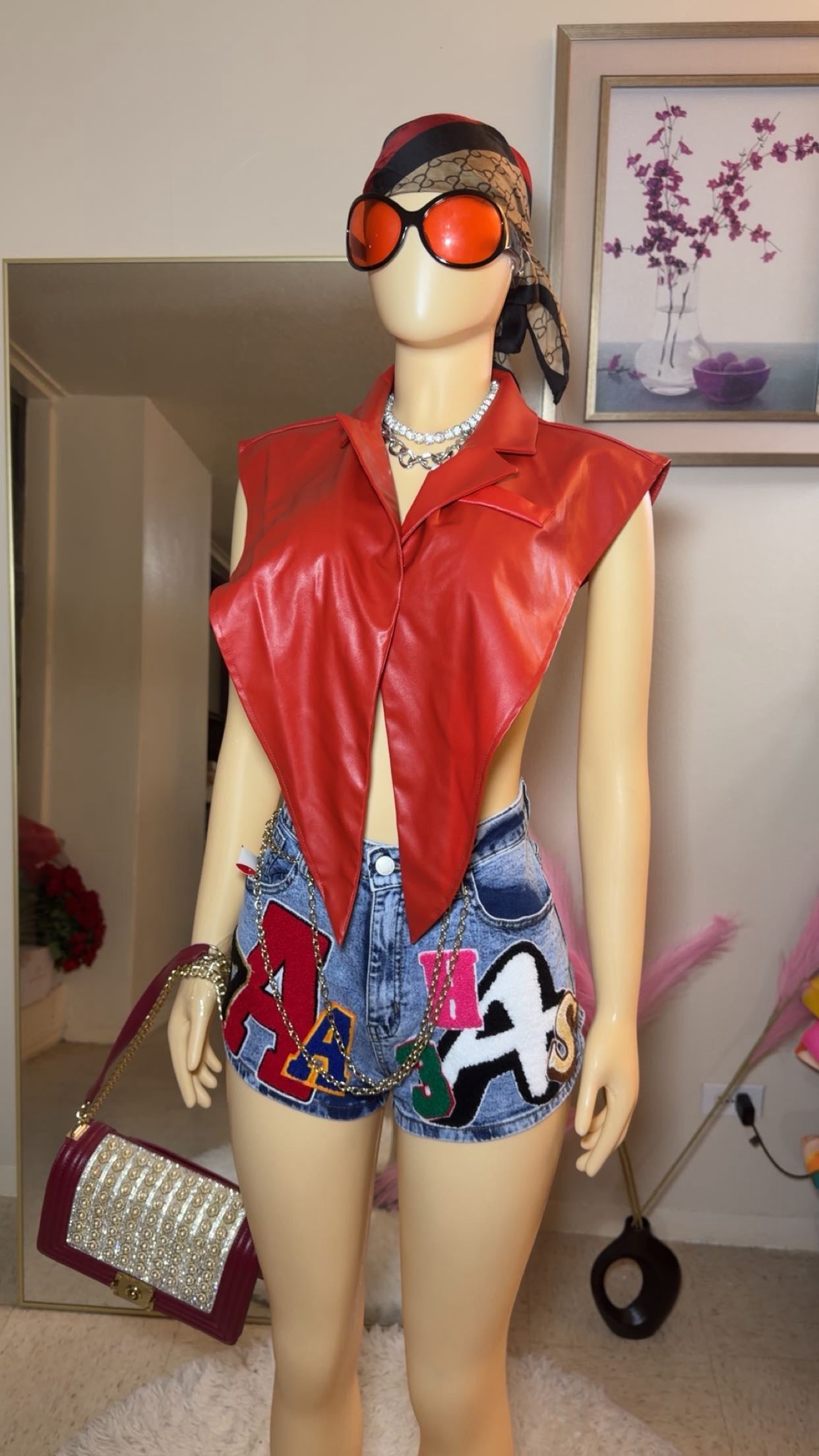 AA monogram print denim shorts